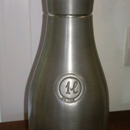 Tin bottle new handmade with authenticity stamp