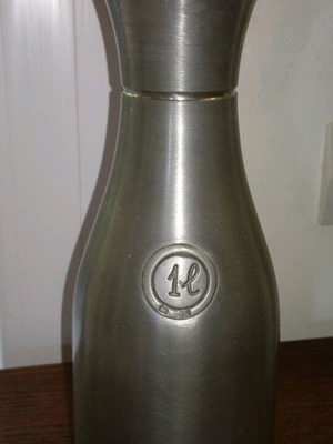 Tin bottle new handmade with authenticity stamp
