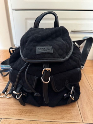 Migato backpack like new, black quilted with blue straps
