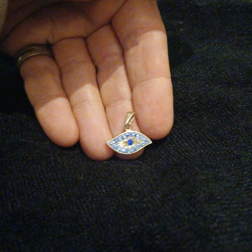 Silver evil eye pendant like new, turquoise and silver