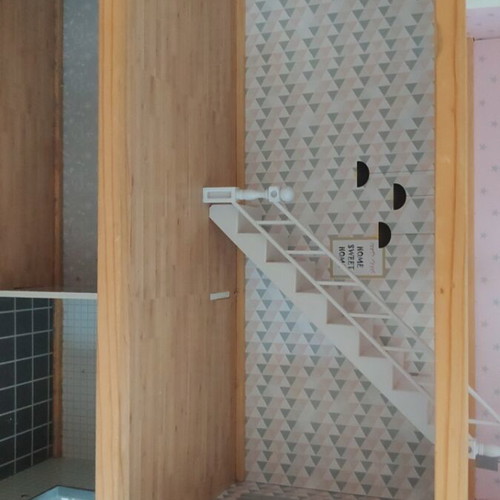 Wooden dollhouse used, 3 levels with stairs and decoration