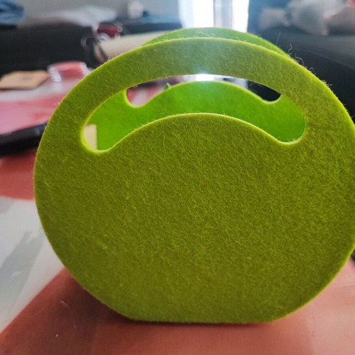 Felt basket like new with stamps on the inner side