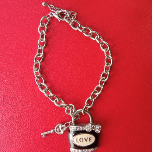 Bracelet with hanging charms used