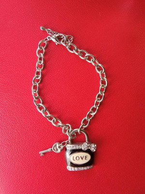 Bracelet with hanging charms used