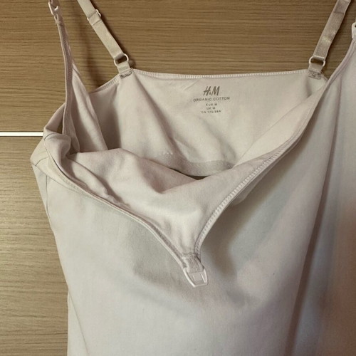H&M white nursing tank top with adjustable straps and easy-release clips
