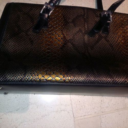 Shoulder bag like new with snake pattern