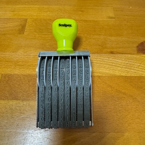 Sculpey stamp roller like new with letters