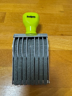 Sculpey stamp roller like new with letters