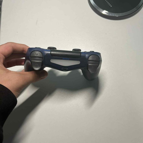 PlayStation 4 DualShock controllers new, red and dark blue, set of two