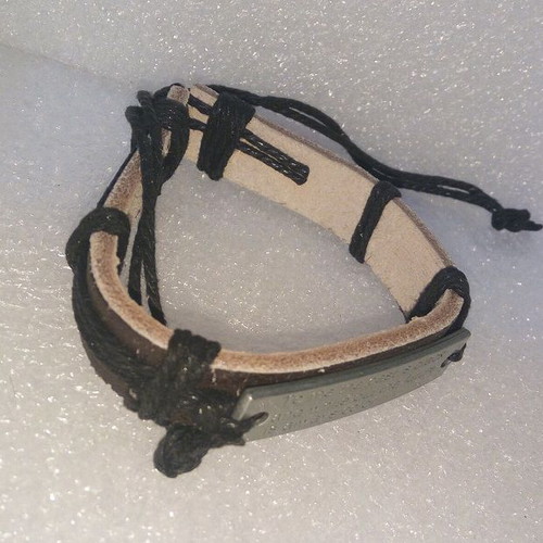 Handmade leather bracelet with metal message, like new