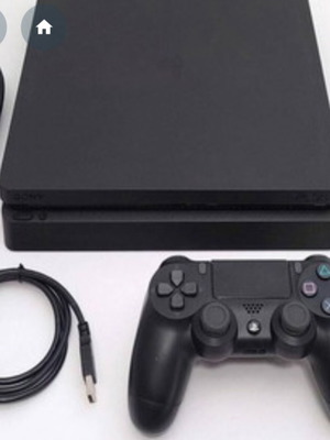 PlayStation 4 console with broken fan, used, includes two controllers