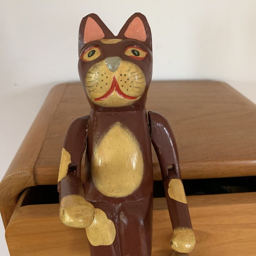 Wooden sitting cat with movable arms, like new, ~20 cm
