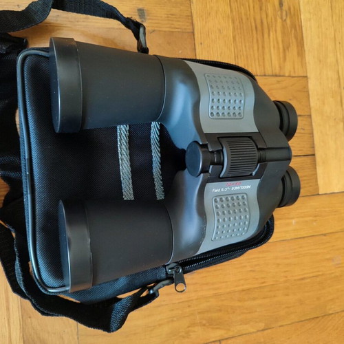 Binoculars new with carrying case, manual and cleaning cloth