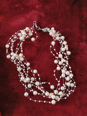 Floating Pearl Necklace like new, multi-strand elegant design
