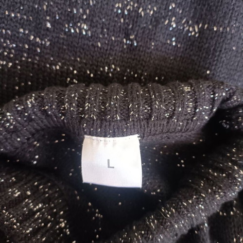 Women's black glitter sweater used, size L