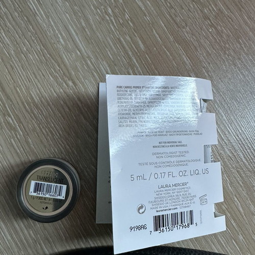 Laura Mercier beauty pouch with translucent powder and hydrating primer new