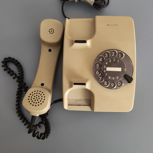 Siemens vintage telephone with rotary dial used