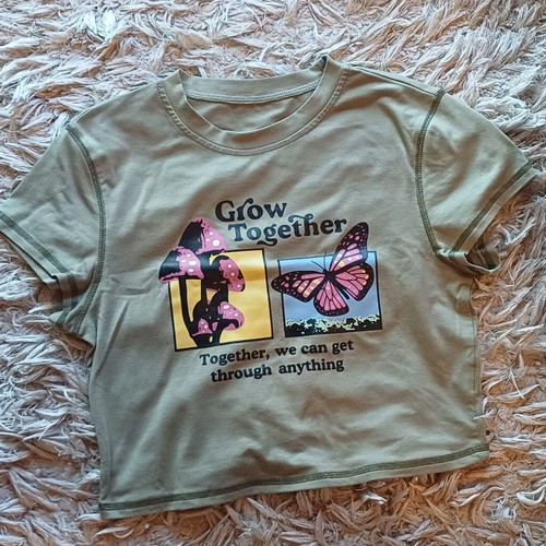 Romwe women's crop top size M like new, khaki with graphic design
