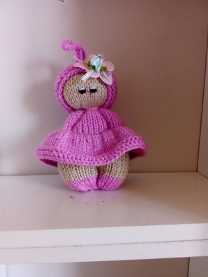 Knitted doll handmade with needles, new