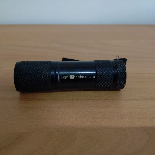 Small flashlight like new, takes 3 AAA batteries