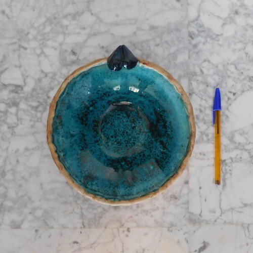 Decorative handmade ceramic plate with turquoise glaze, vintage, like new