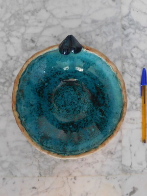 Decorative handmade ceramic plate with turquoise glaze, vintage, like new