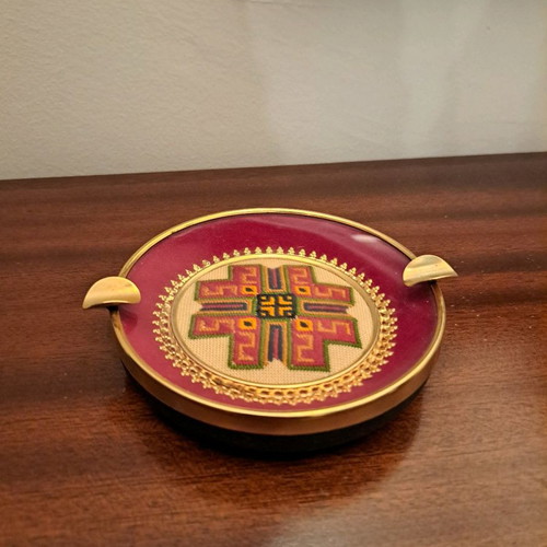 Vintage ashtray used with ornate design