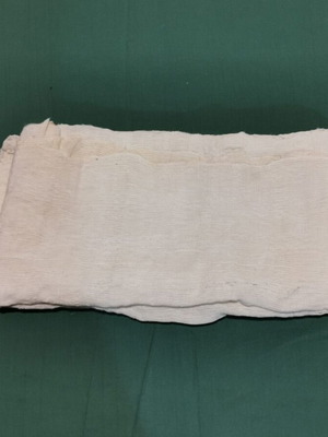 Wool woven bed sheet used with stain and wear from 1930 era