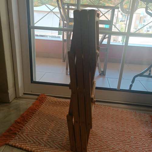 Reclining wooden wine rack used
