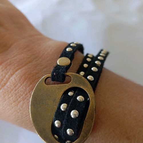 Rock bracelet with black cord and studs adjustable