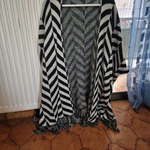 Poncho jacket like new with geometric patterns and fringes