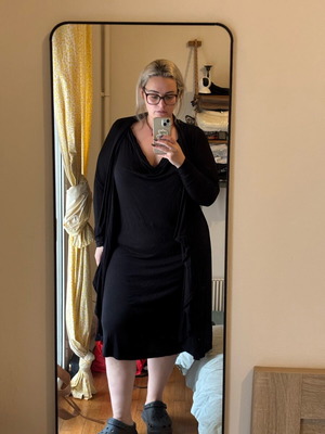 Mat long-sleeve black dress like new with deep neckline and cardigan detail
