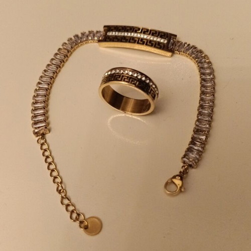Bracelet and ring set made of steel with archaic design and rhinestones, new, gold