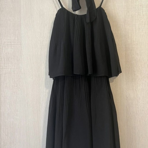 Black Mini Dress like new with ruffles and straps, sizes S-M