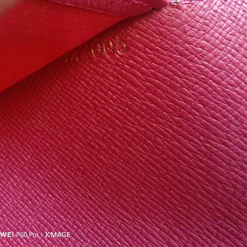 Louis Vuitton wallet used, authentic with visible marks inside