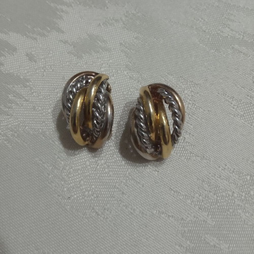 Ornate two-tone earrings used, gold and silver color