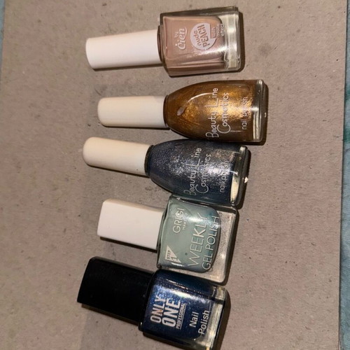 Nail polishes new, pack of 5 with blue, gold and nude shades