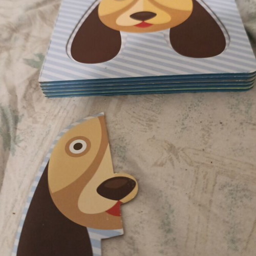 Children's book and puzzle used, Faces with Pets