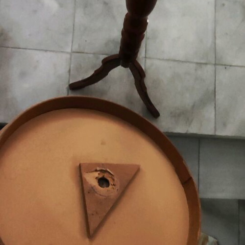 Tripod table in dark wood used, needs repair