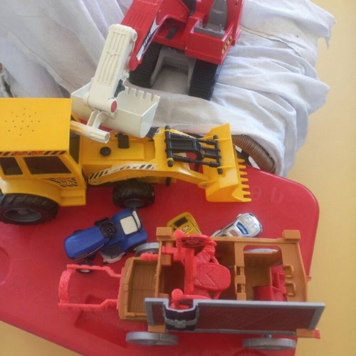 Toy vehicle set used with Playmobil excavator and Fischer Price carriage