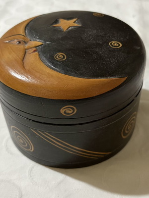 Vintage wooden round storage box with carved designs