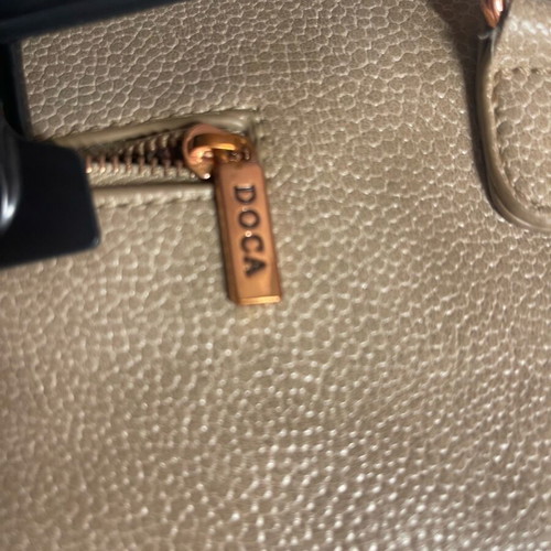 Doca envelope bag used, beige with minor repair needed