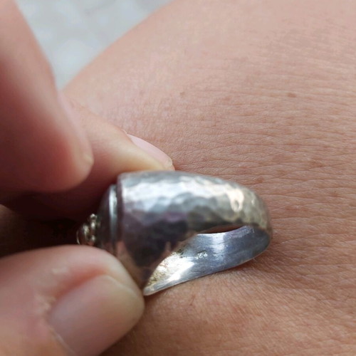 Women's ring used, hammered silver with gold