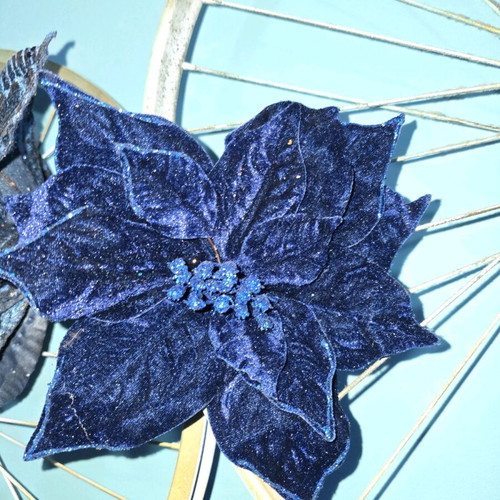 Christmas flowers used, dark blue decorations