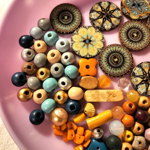 Decorative beads and buttons used, wooden