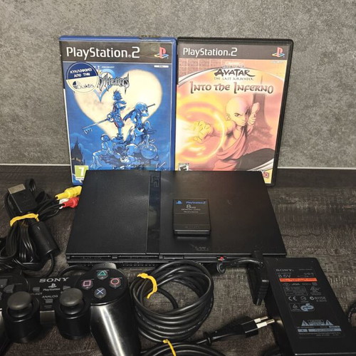 PlayStation 2 Slim console bundle with 2 games