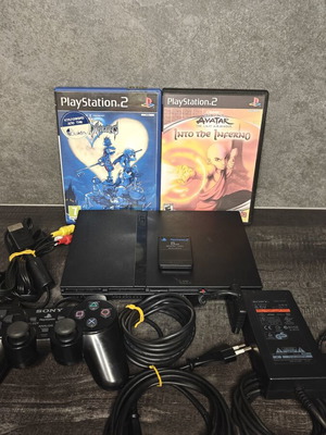 PlayStation 2 Slim console bundle with 2 games