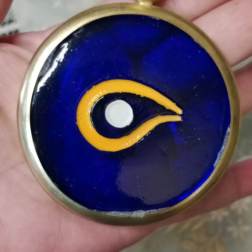 Vintage glass eye like new with ring and stainless metal