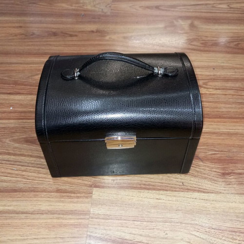 Vintage black jewelry box used with mirror and beige lining