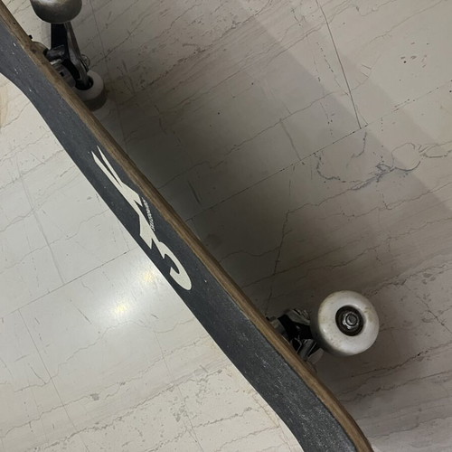 Skateboard used with satellite design on bottom